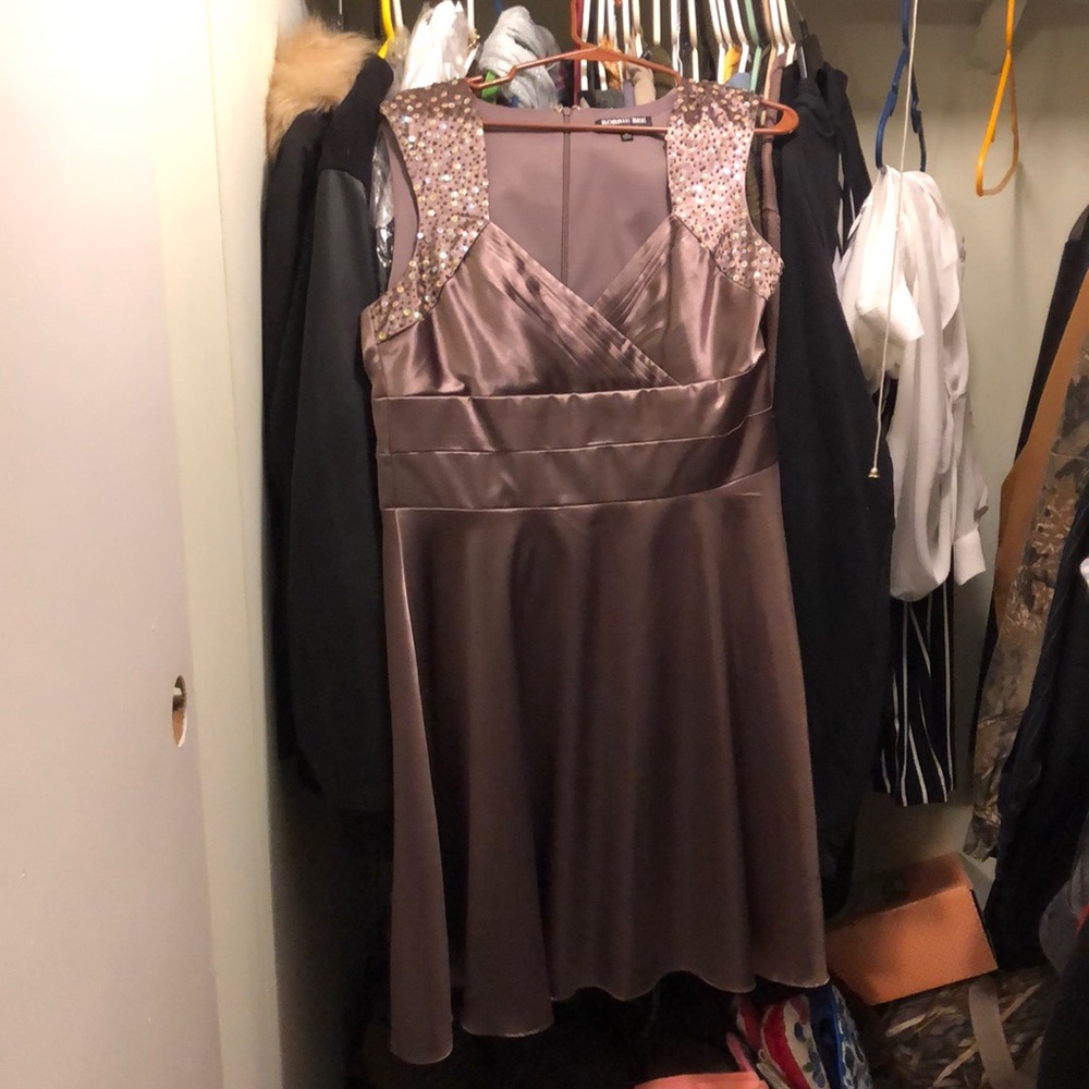 Robbie Bee being dress